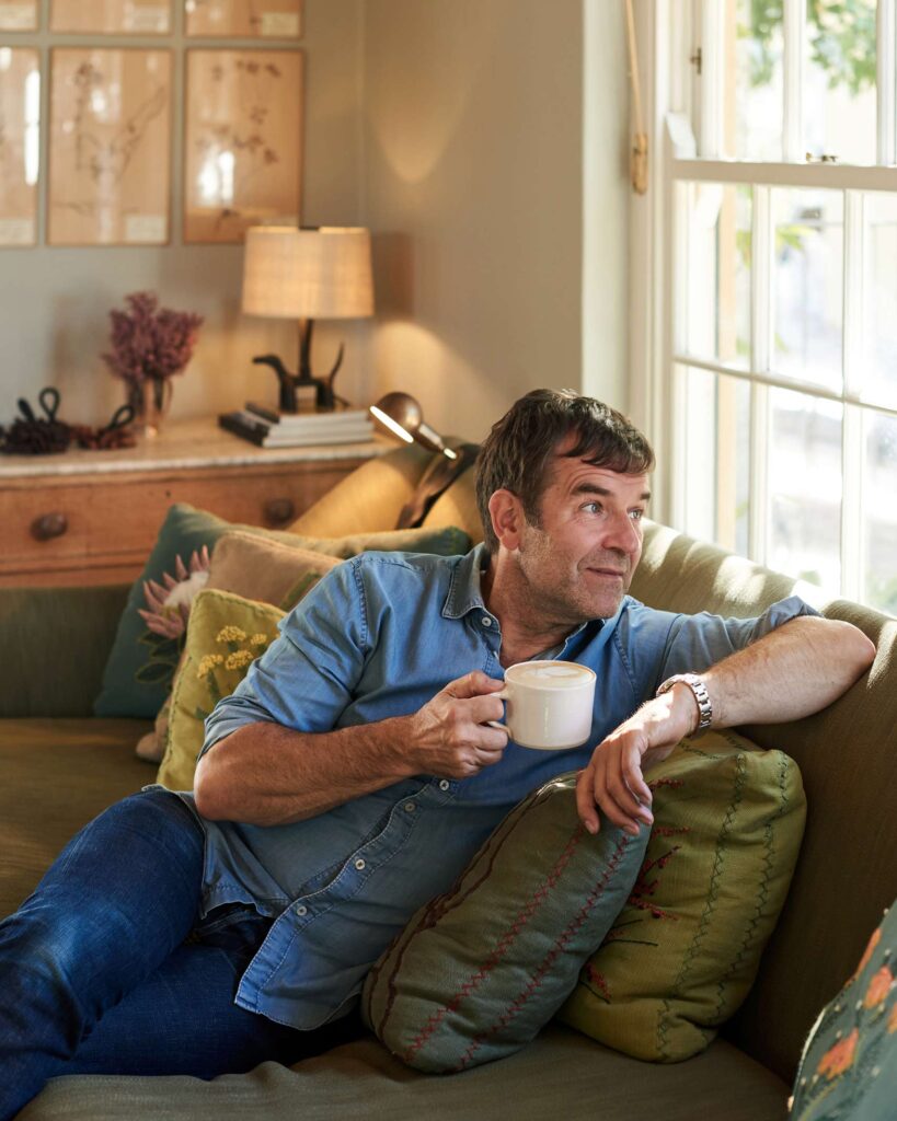 Marc-Ludolf von Schmarsow enjoys a cup of coffee at 7 Koppies, Franschhoek, South Africa