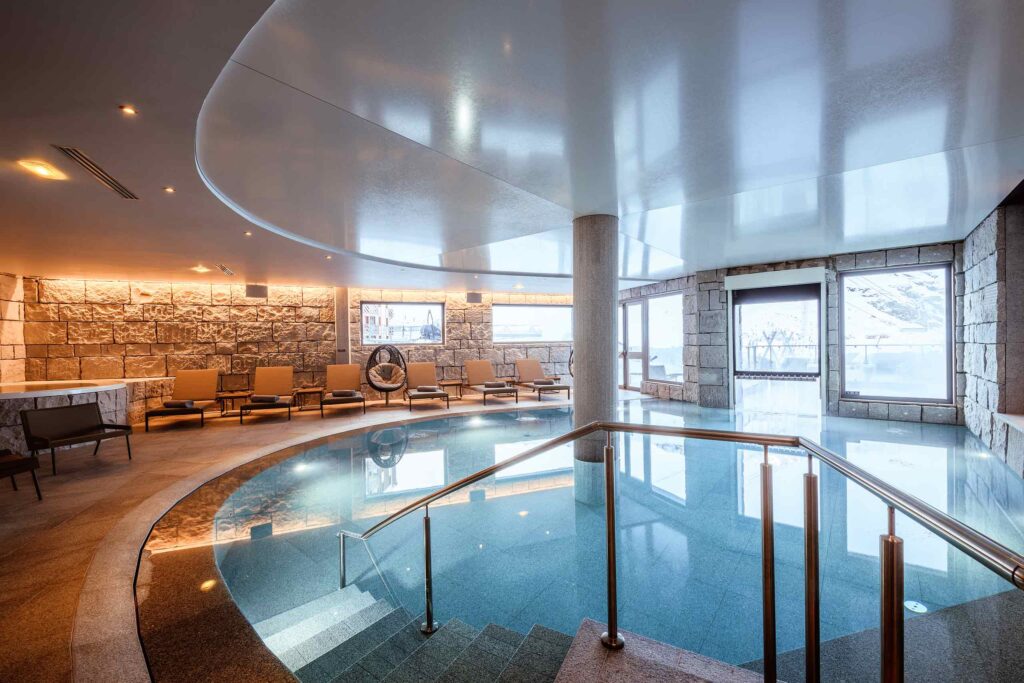 A round indoor pool at The Spa by Codage in Val Thorens, Les Trois Vallées, France