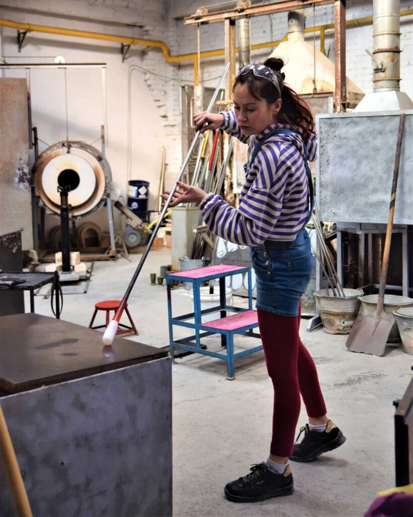 A glass blower at work in Murano, Venice, Italy