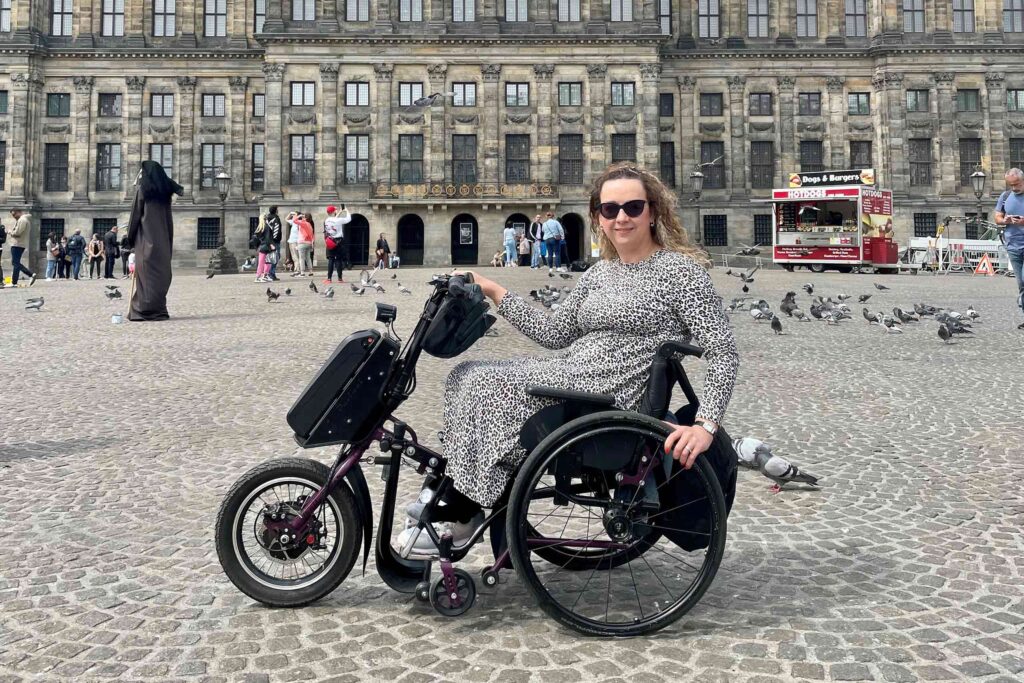 A disabled traveller in a wheelchair on travels in Amsterdam