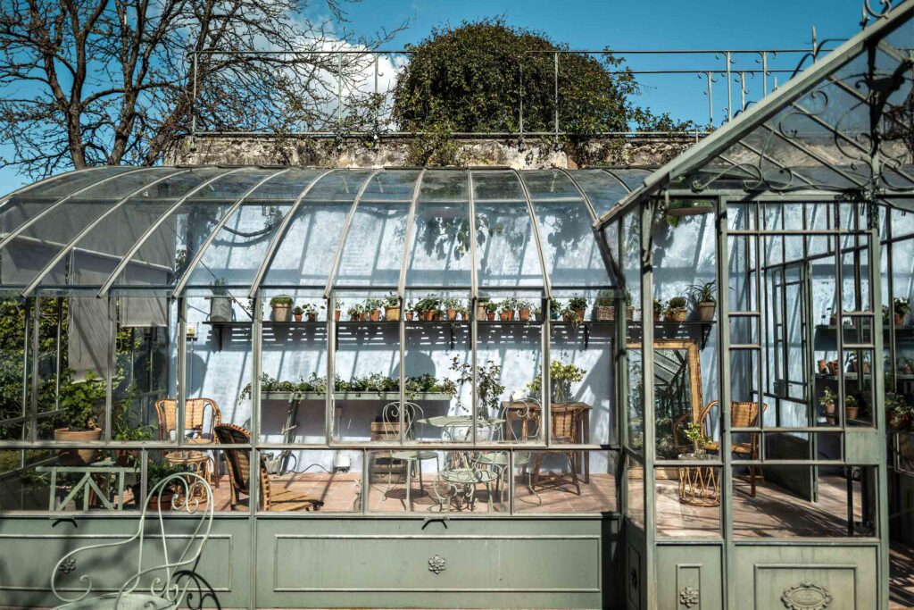 An olive-coloured greenhouse at Domaine de Primard Guainville.