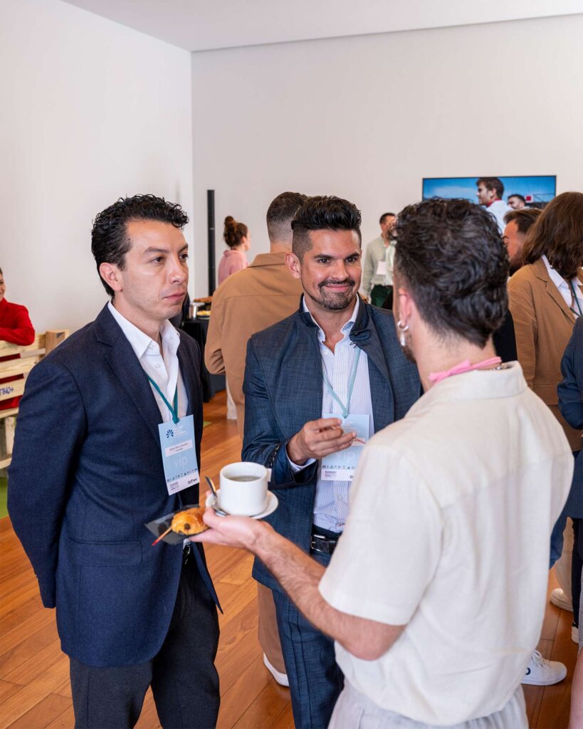 Delegates network over coffee and pastries at the LGBT+ Travel Symposium.