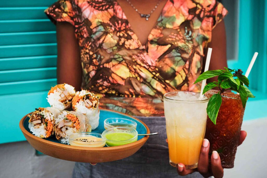 Woman holding contemporary eats in Lafayette