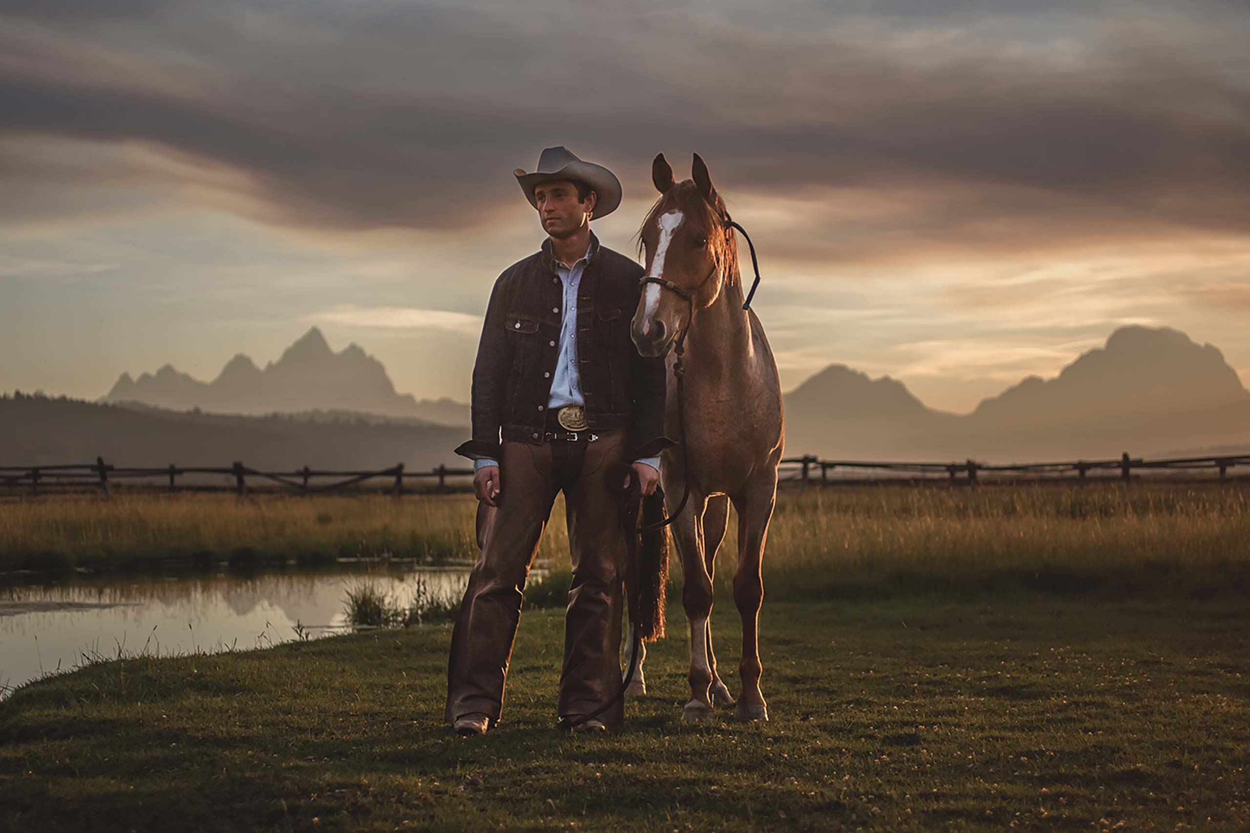 Cowboy and his horse at Diamond Cross Ranch, Jackson Hole