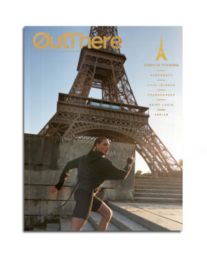 OutThere Paris is turning issue cover with model Koko running past the Eiffel Tower