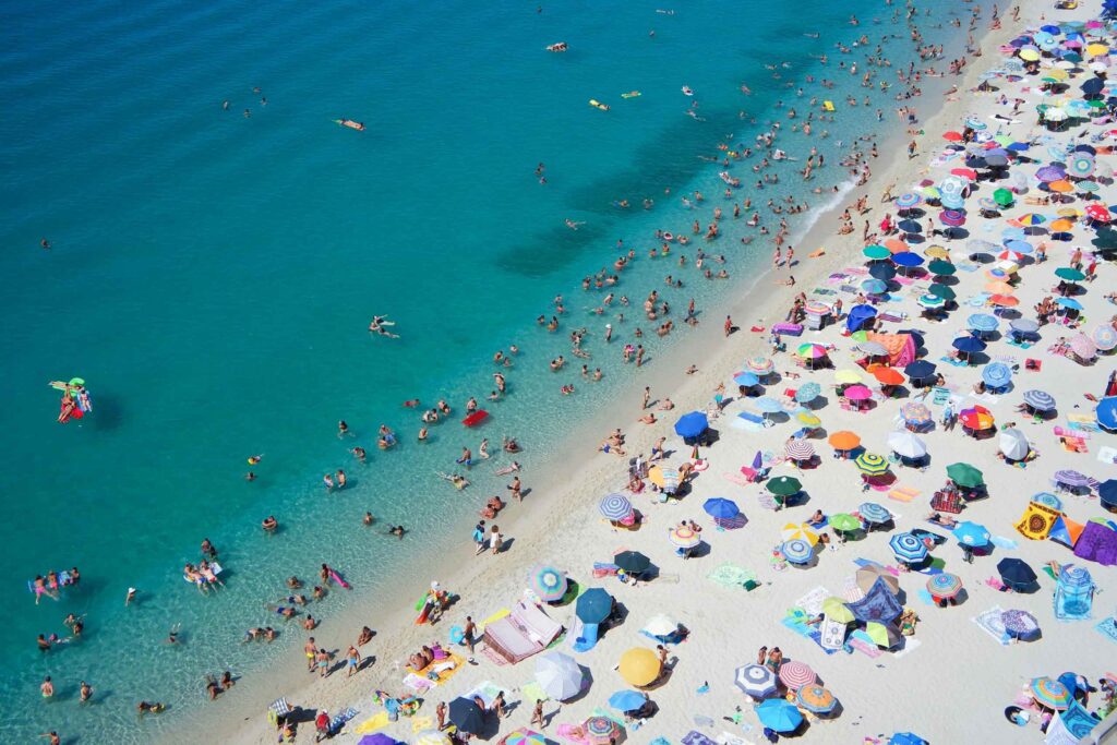 A beach in Tropea, Italy, seen my above. It's the sort of destination making travellers look for alternative destinations in Europe