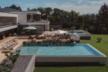 The contemporary Ultima Grand Villa Geneva private villa with pool by Ultima Collection